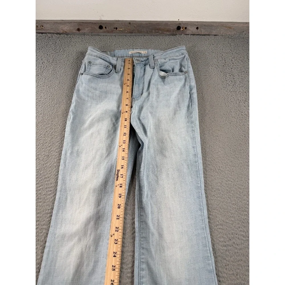 Levi's 725 High Rise Bootcut Jeans Womens 30 (26x32) Light Wash Raw Hem